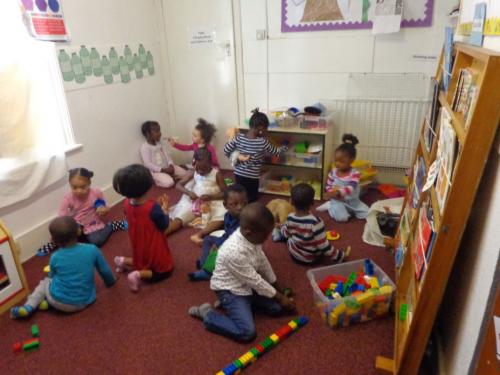 Playing at Rehoboth day nursery, Deptford, London