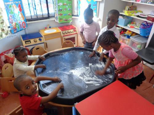 Messy time at Rehoboth day nursery, Deptford, London